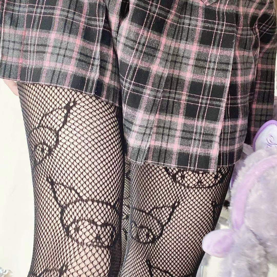 SNAKE-WEAVE FISHNET TIGHTS: Bold Style